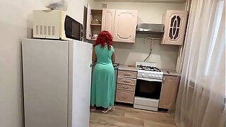 Mom with a big ass smug her son with her anal adjacent to put emphasize kitchen